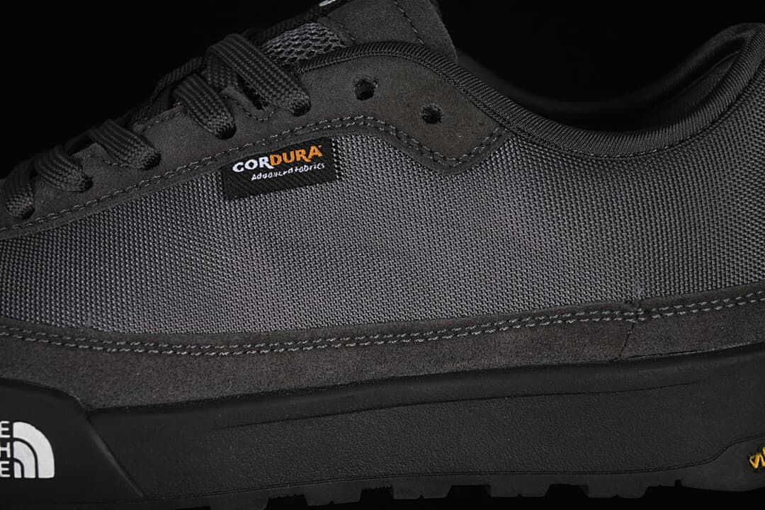 Close-up of the charcoal grey upper, overlays, and CORDURA tag