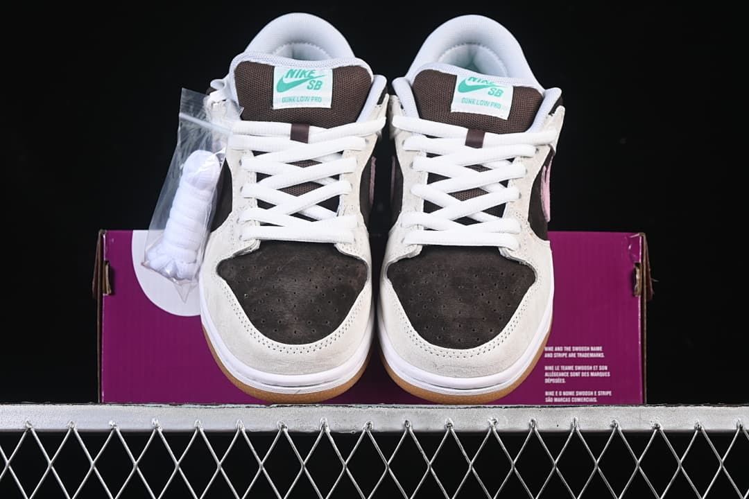 Front view of both shoes with an extra set of white laces