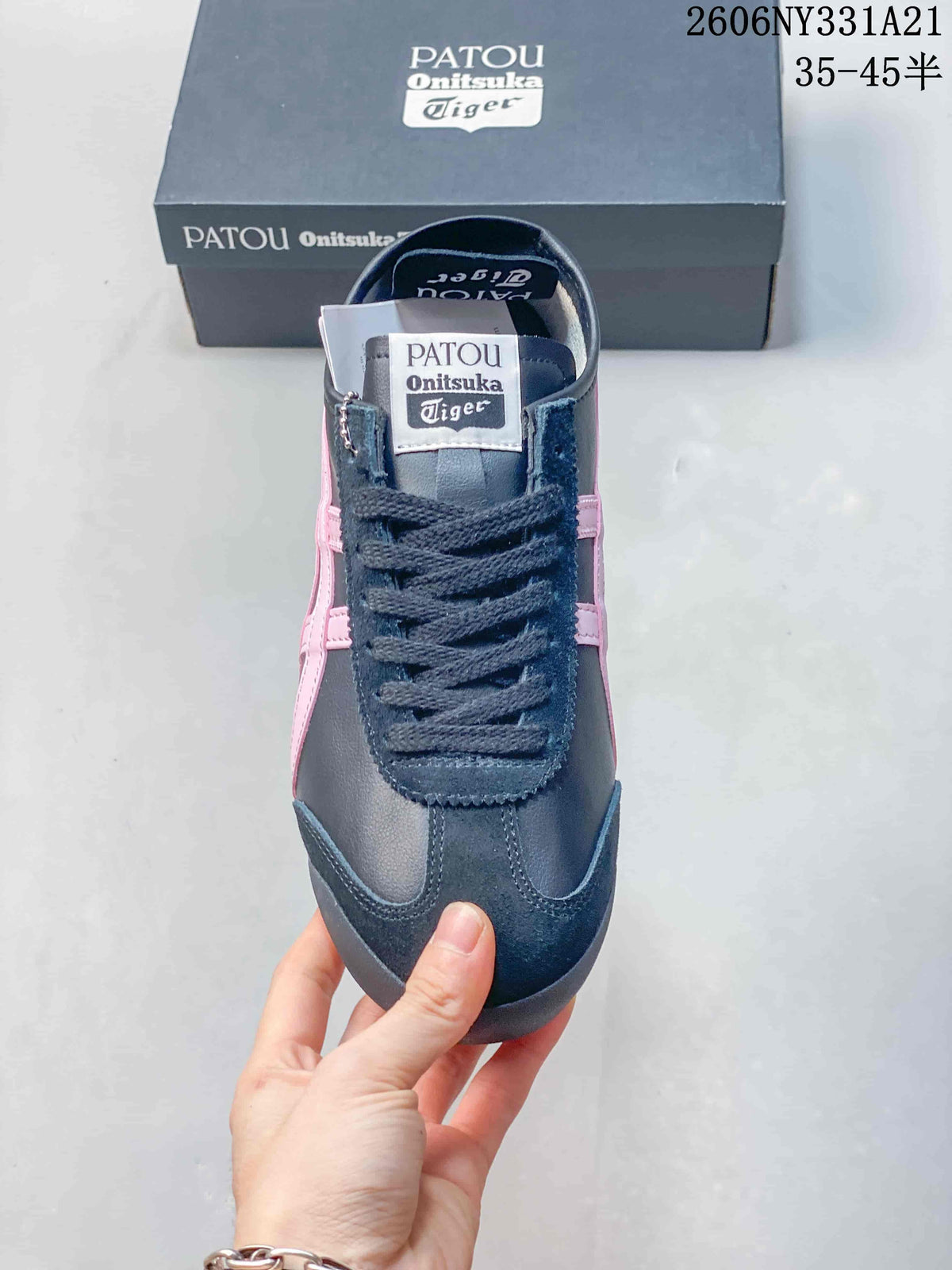 Top view of the navy sneaker showing its laces and branded tongue label