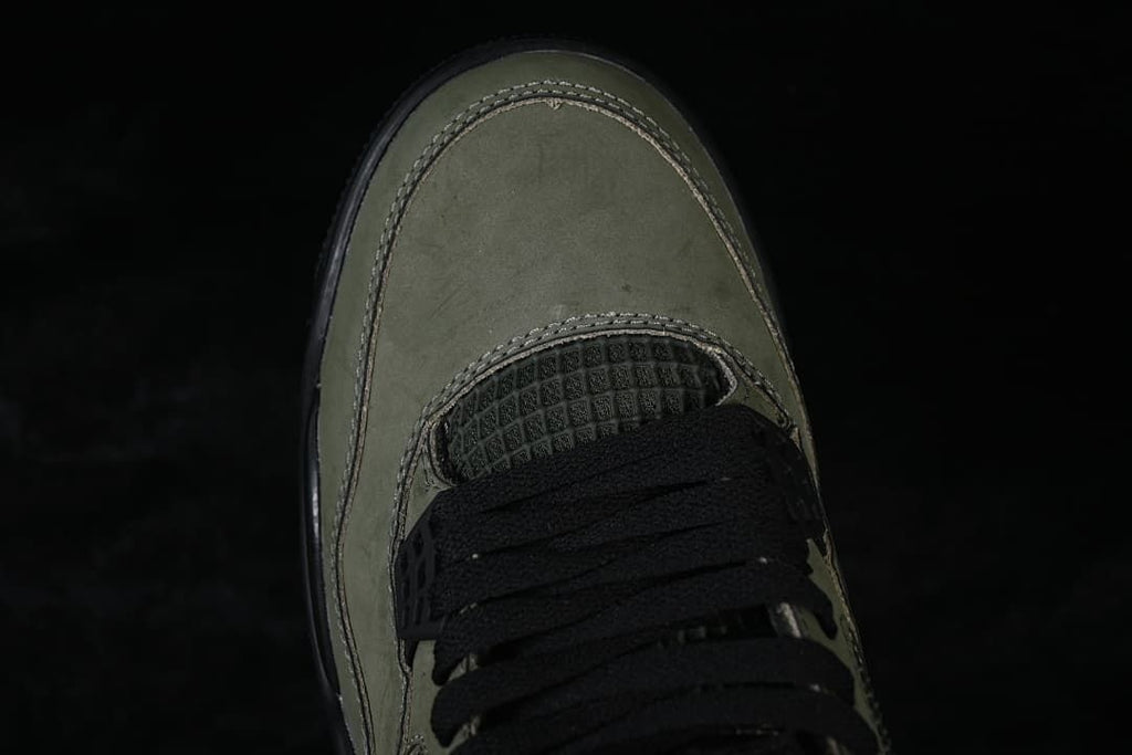 Top view of the olive toe and black laces