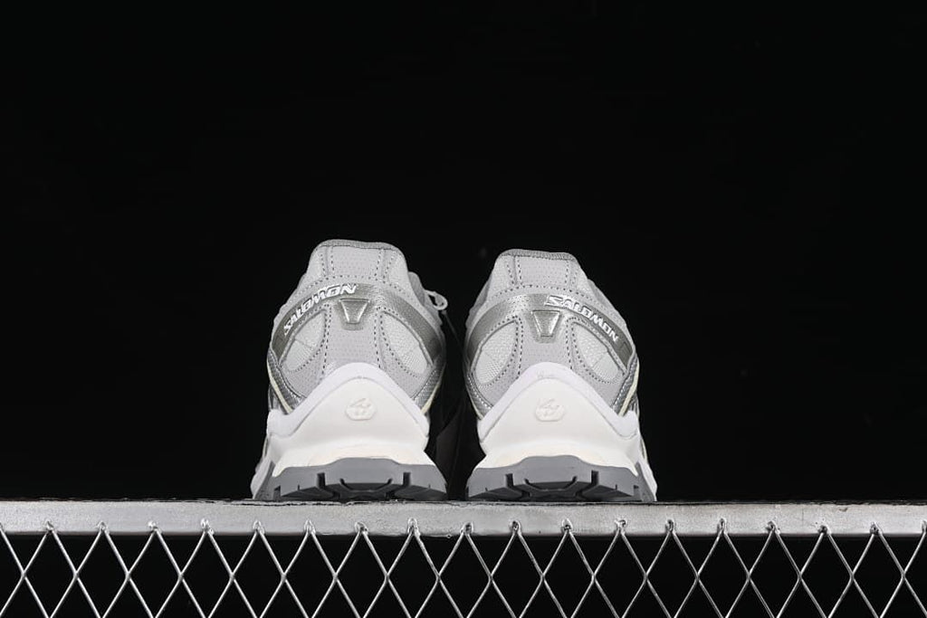 Rear view of the pair showing heel details and tread.