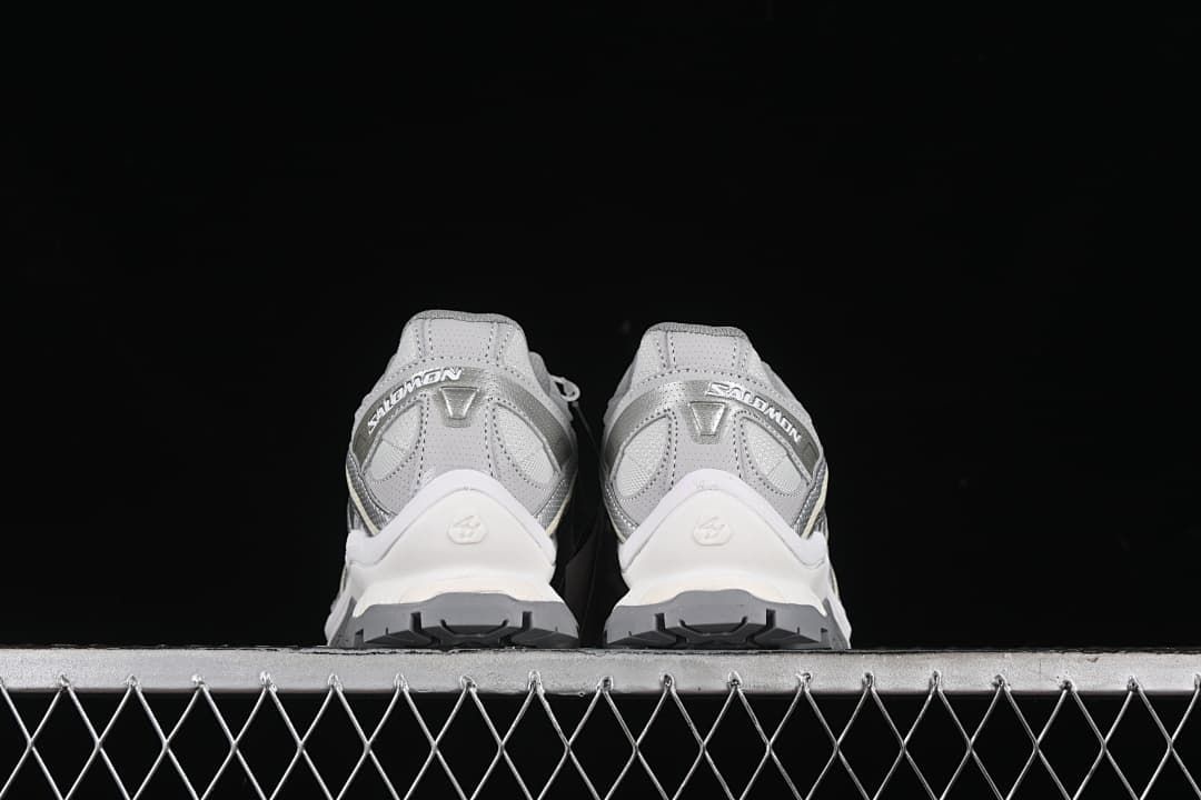 Rear view of the pair showing heel details and tread.