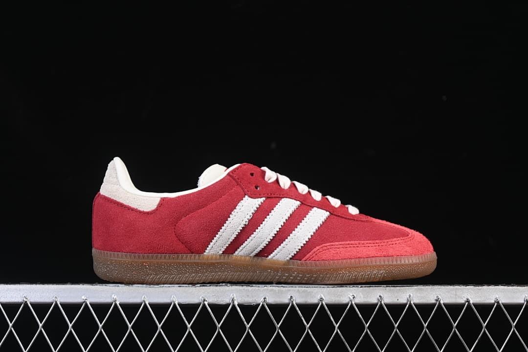 Side profile of the red and white low-top sneaker