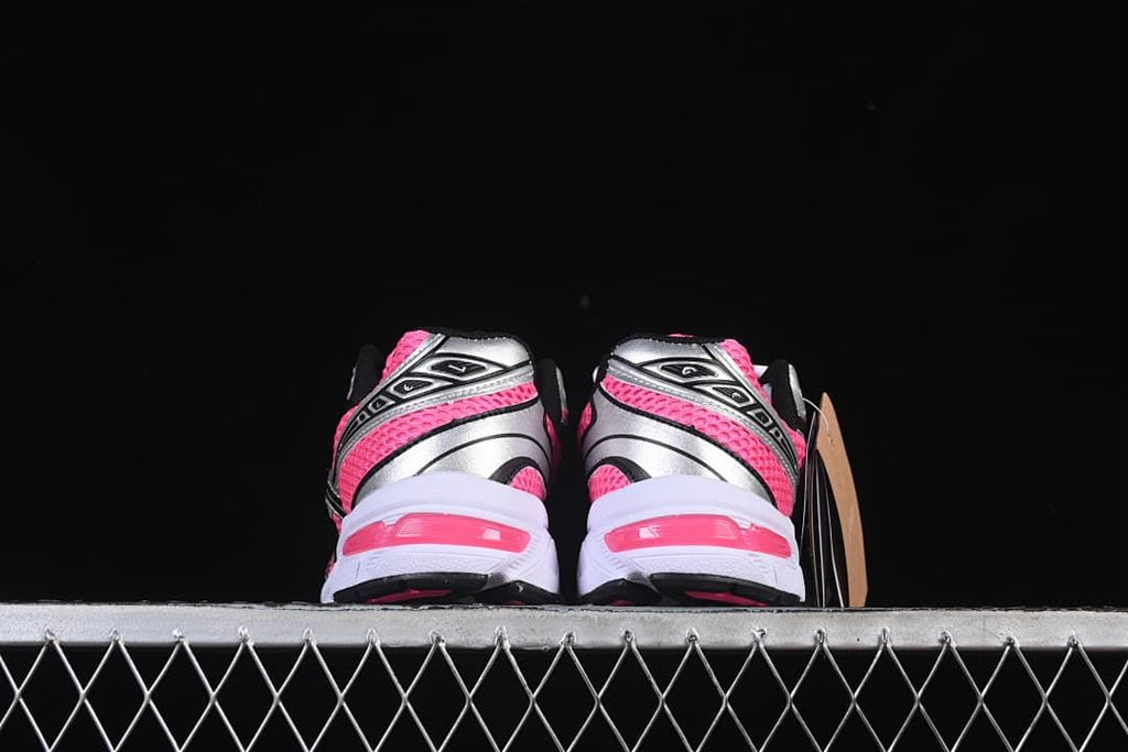 Rear view of the pair showing silver heel panels and pink accents.