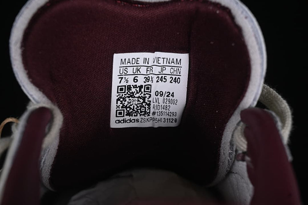 Close-up of the tongue size label showing UK 6, EU 39⅓, US 7½, and JP 245.