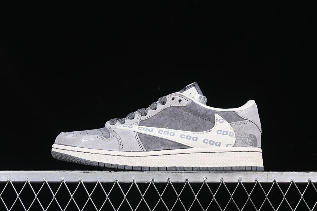 Side view of the gray and white low-top sneaker
