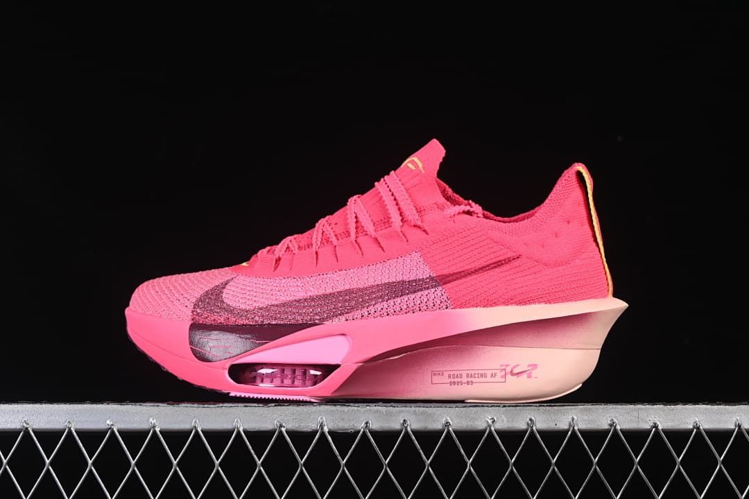 Side view of a pink Nike ZoomX Vaporfly 3 running shoe