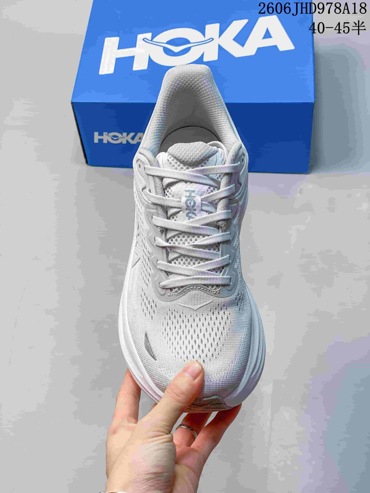 Front view of a HOKA Bondi 9 shoe with lace-up closure
