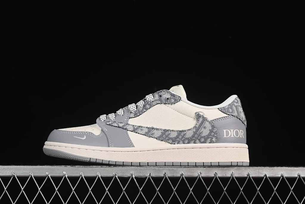 Side view of a gray and white low-top sneaker with patterned overlays and a contrasting heel panel