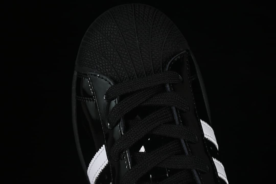 Top-down close-up of the black shell-toe front and laces