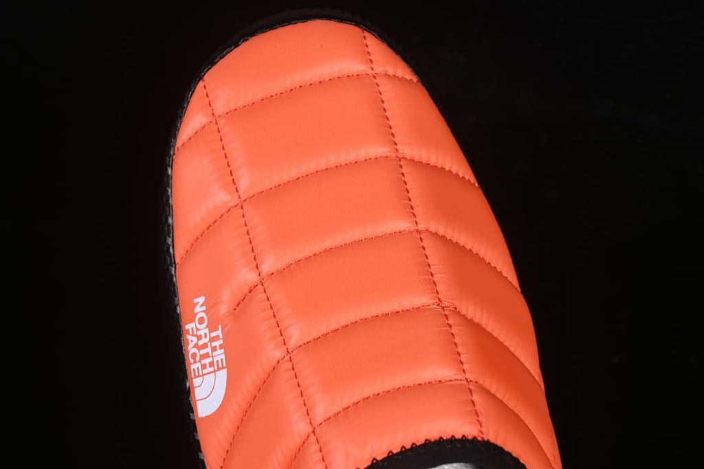 Top-down view of the orange quilted toe area