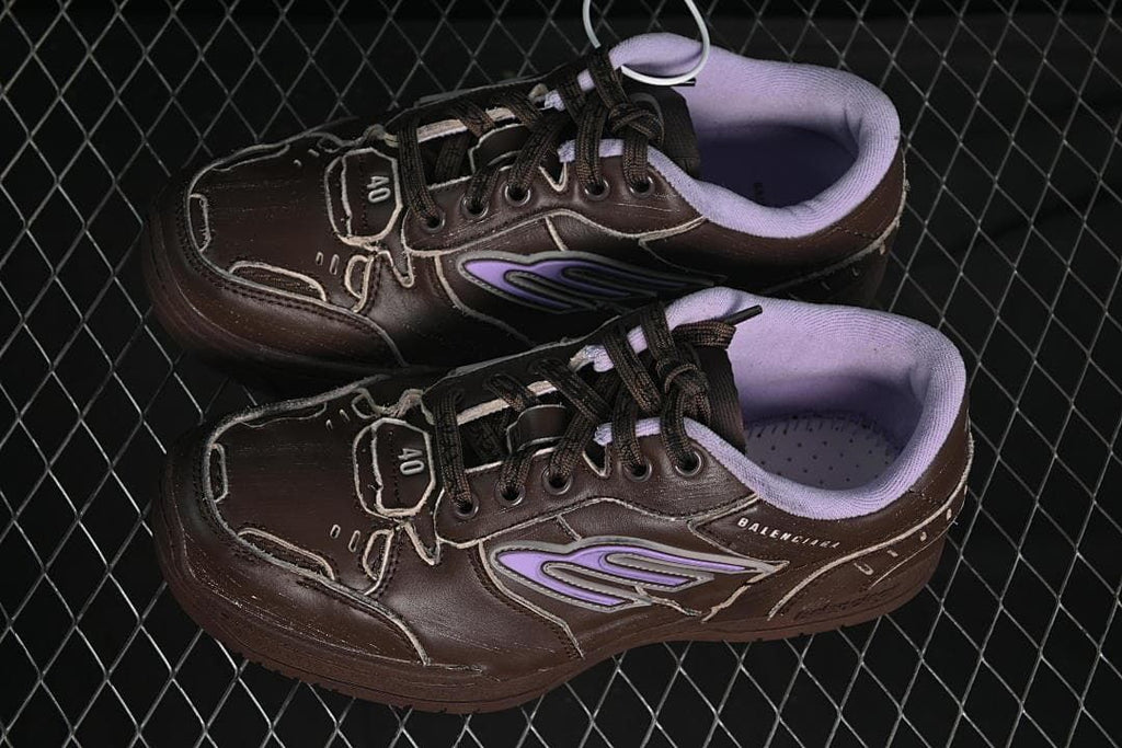 Pair of dark brown and lavender lace-up sneakers viewed from above