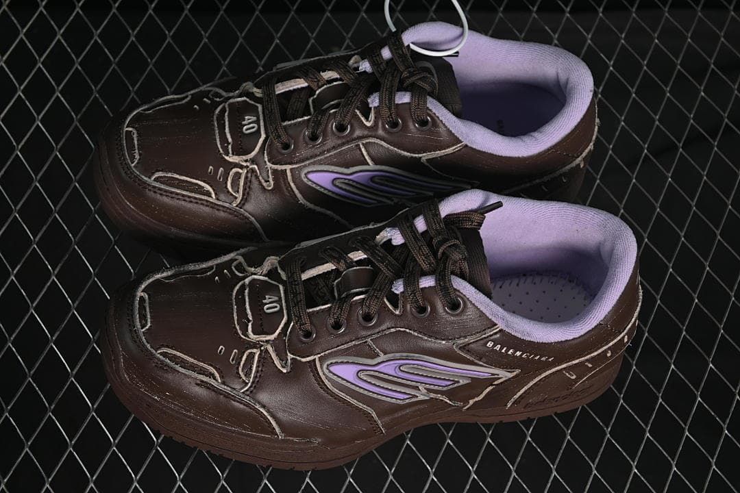 Pair of dark brown and lavender lace-up sneakers viewed from above