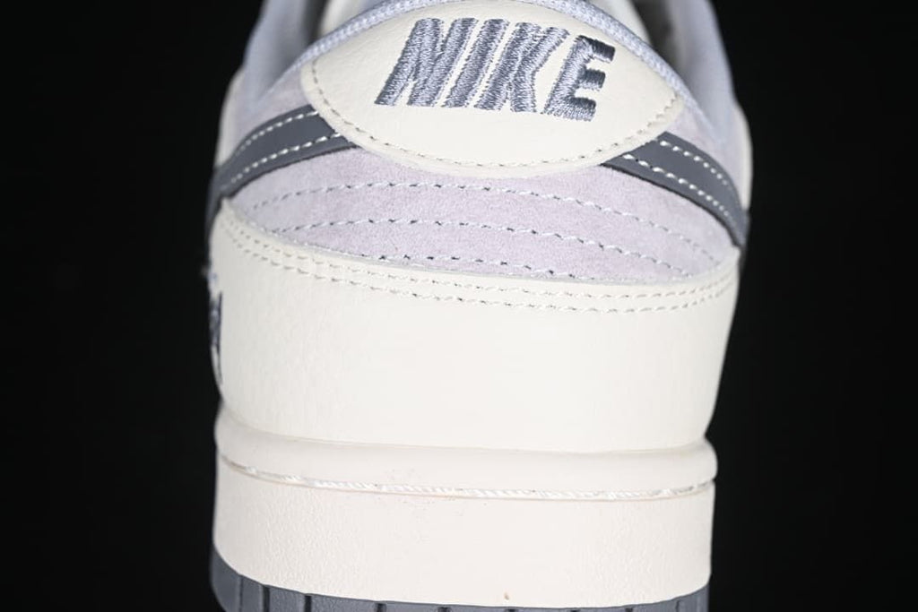 Rear view showing layered heel panels and Nike branding