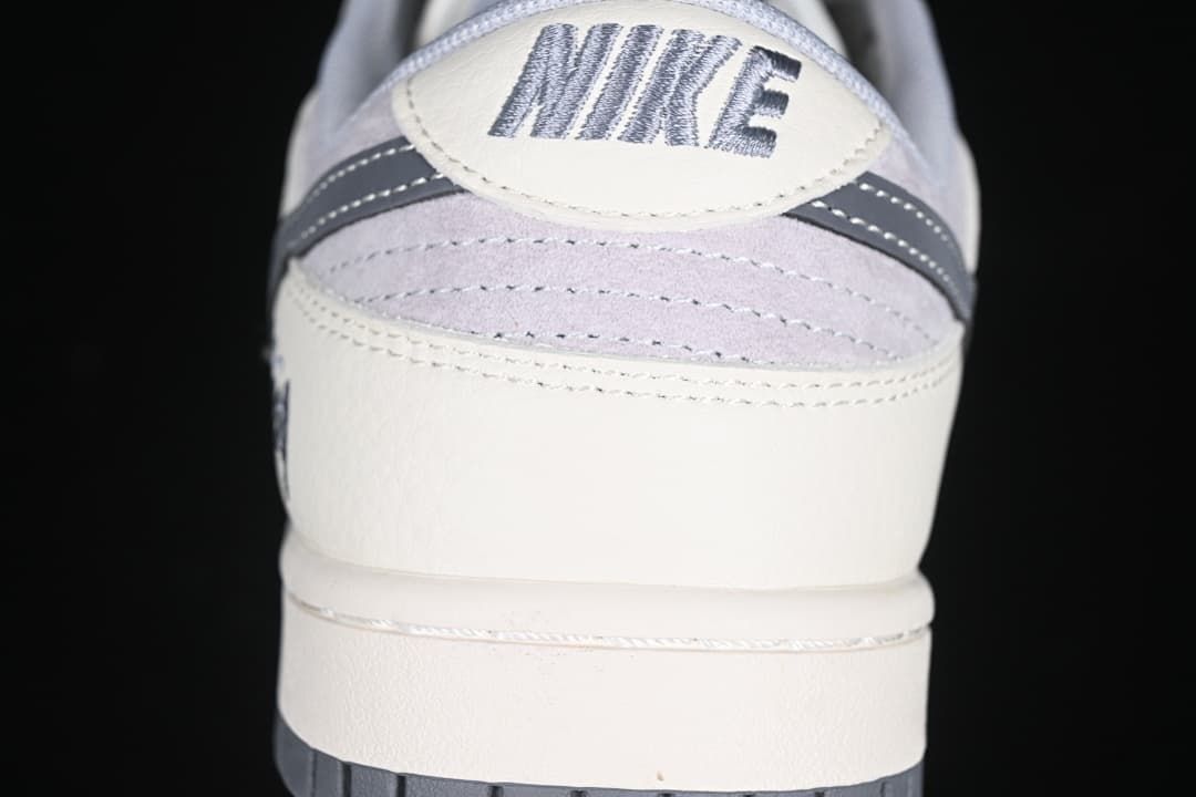 Rear view showing layered heel panels and Nike branding