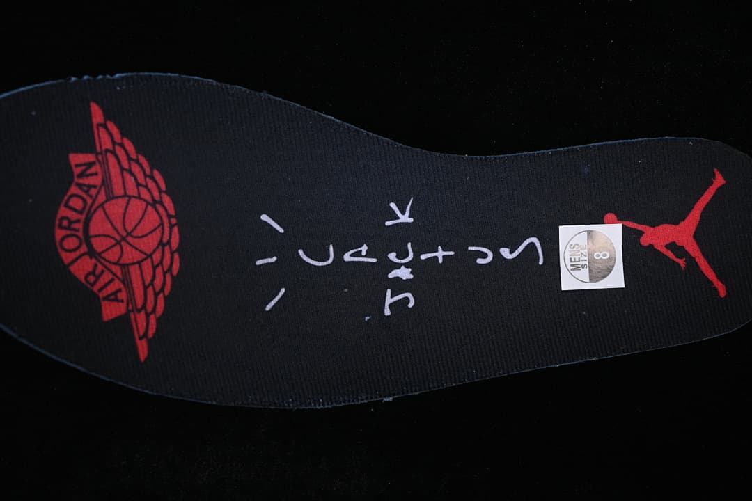 Black insole with red graphics and a visible US men's size 8 marking.