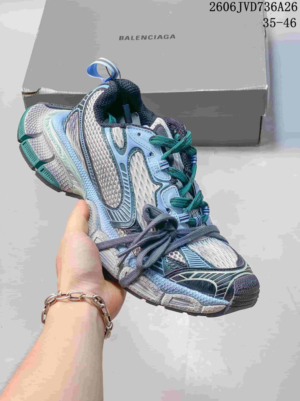 White and gray Balenciaga 3XL sneaker with blue and teal accents