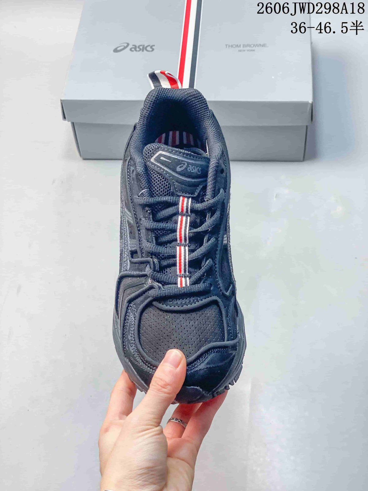 Top view of the sneaker showing its laces, perforated toe panel, and striped detail