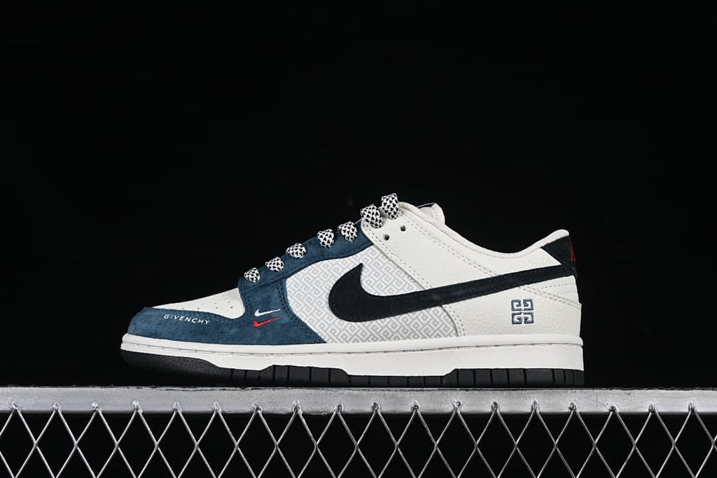 Side view of off-white and navy low-top sneakers with a black Swoosh and geometric-patterned side panels