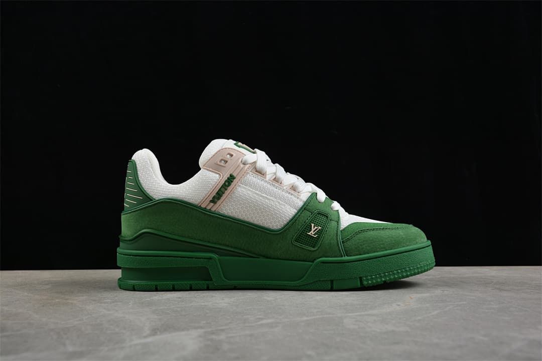 Side profile of the green and white sneaker