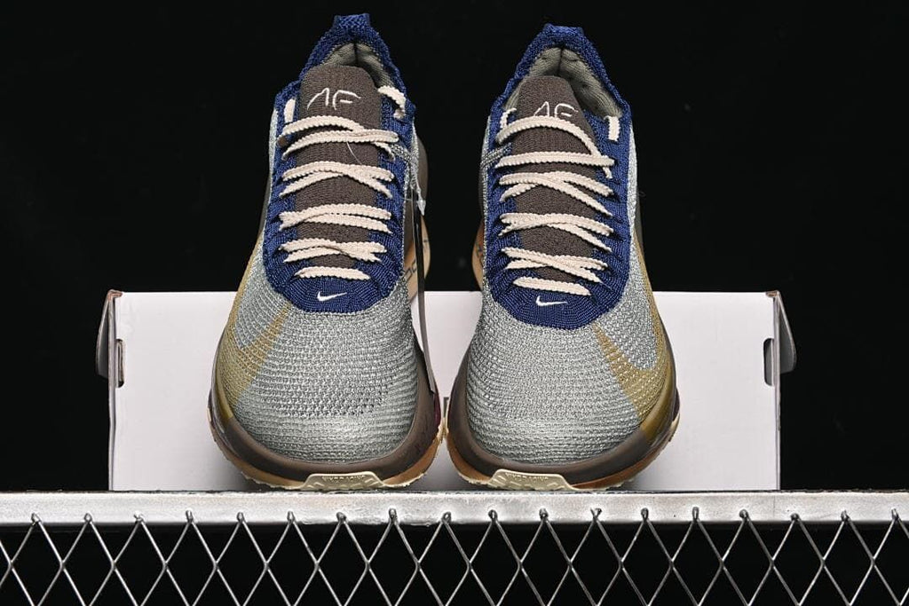 Front view of the pair showing silver-toned toes and navy lace panels