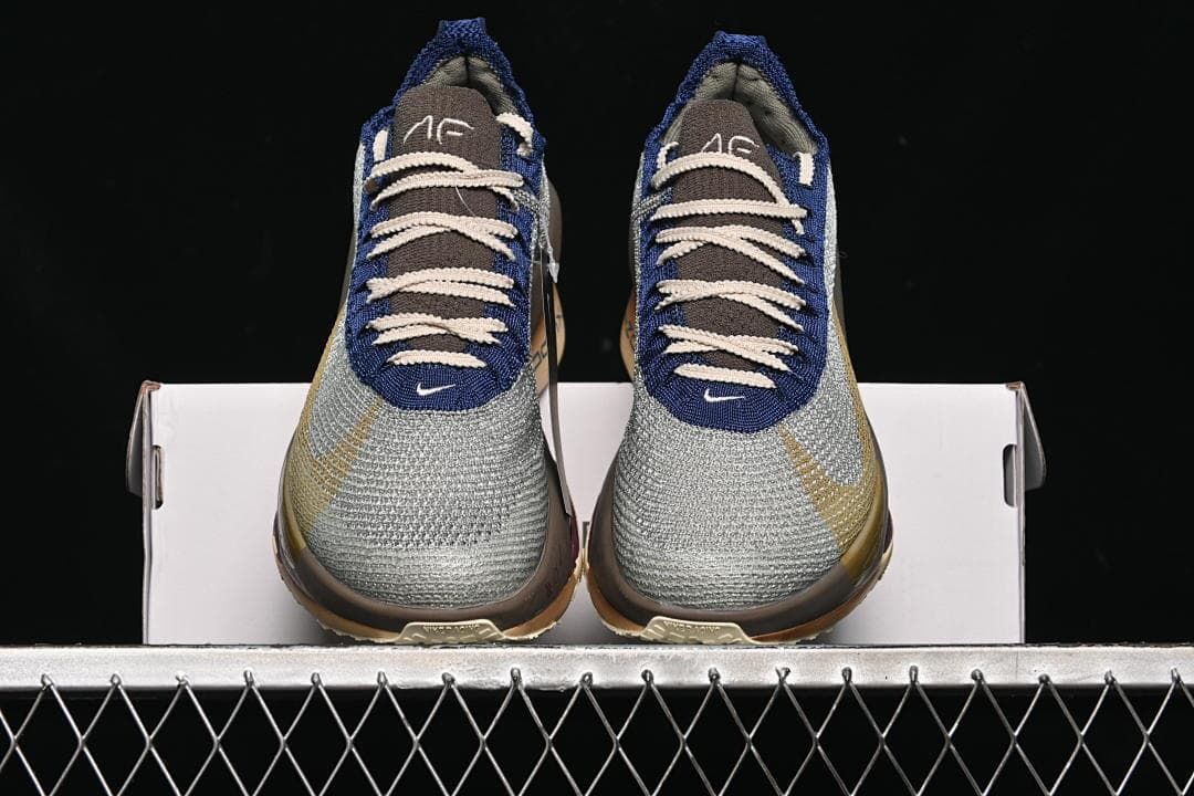 Front view of the pair showing silver-toned toes and navy lace panels