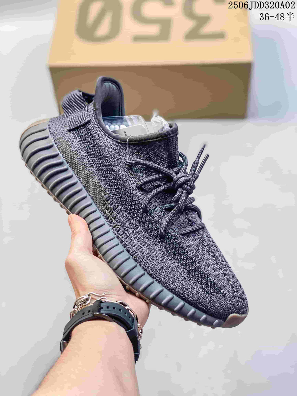 Dark gray knit-look sneaker with matching laces and a ribbed sole