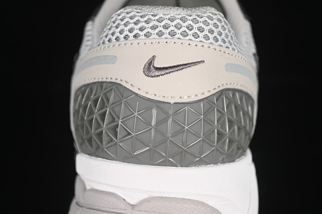 Rear view showing the textured heel panel and small Swoosh.