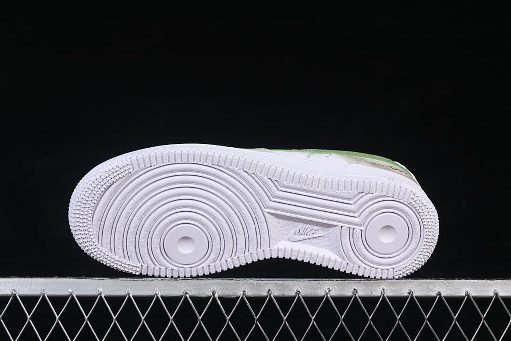 Underside view showing the circular tread pattern on the white outsole