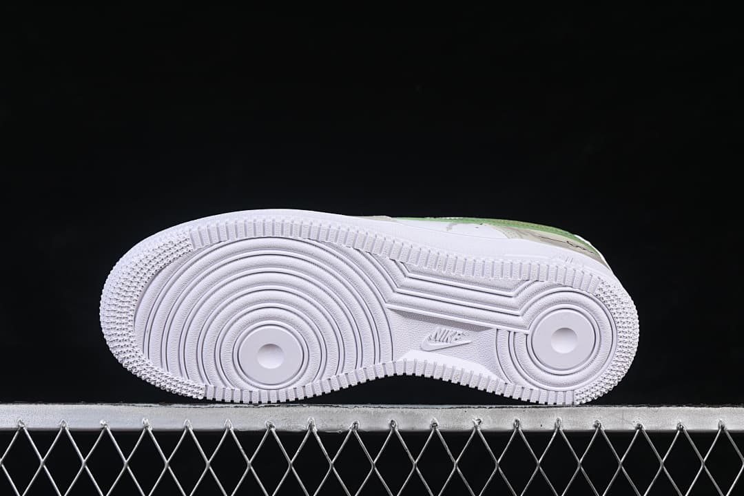 Underside view showing the circular tread pattern on the white outsole