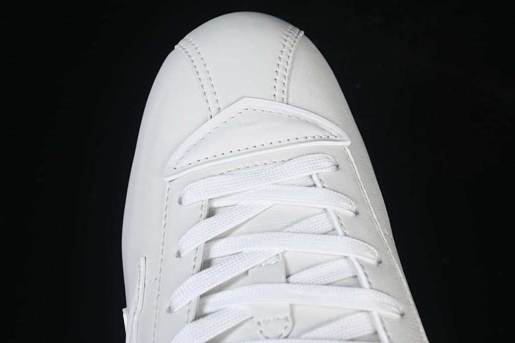 Top view of the lace-up sneaker and tongue