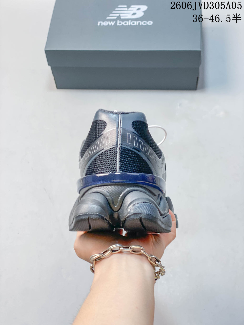 Rear view showing the heel and sculpted sole.