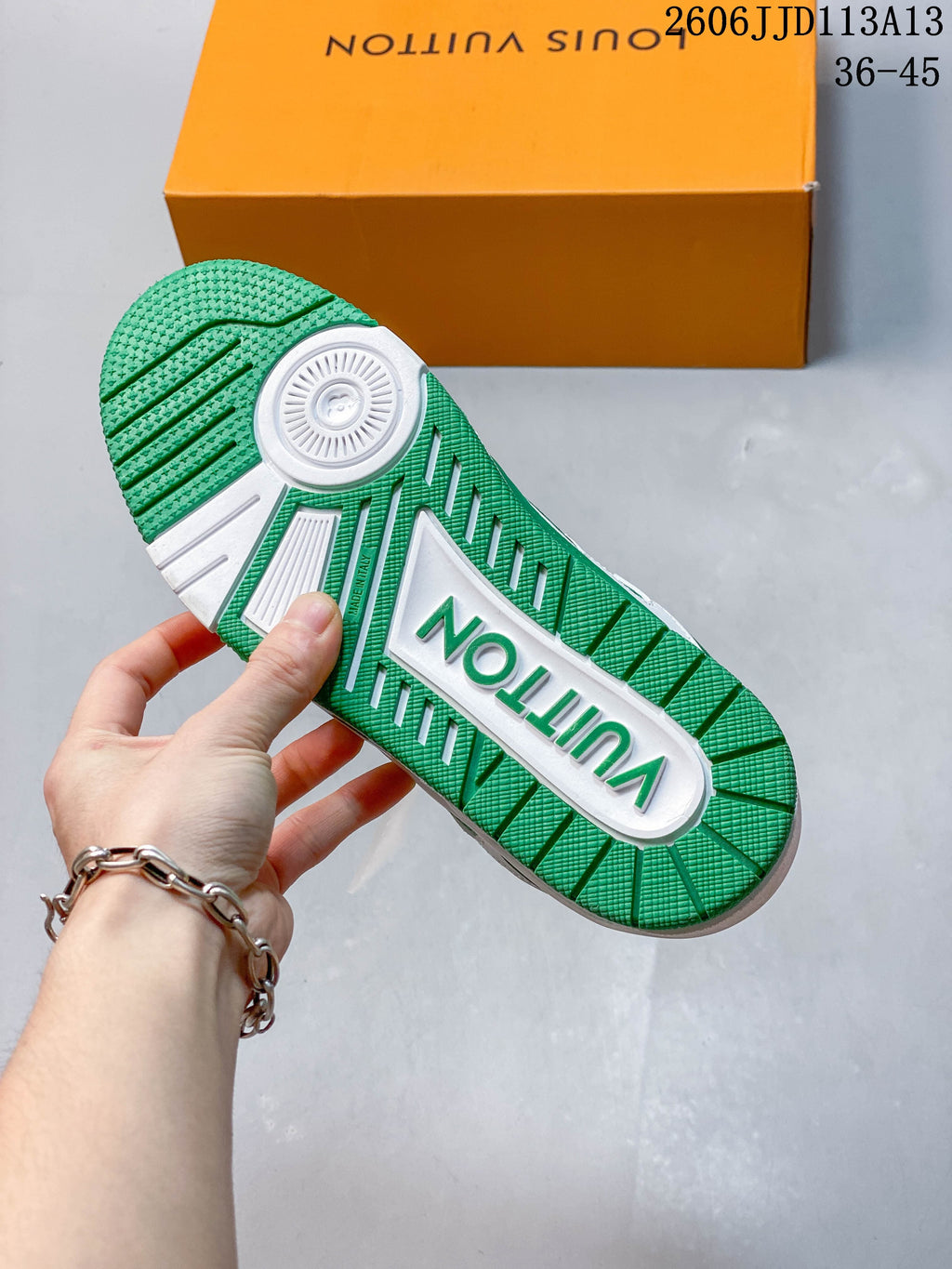 Close-up of the green and white textured outsole.