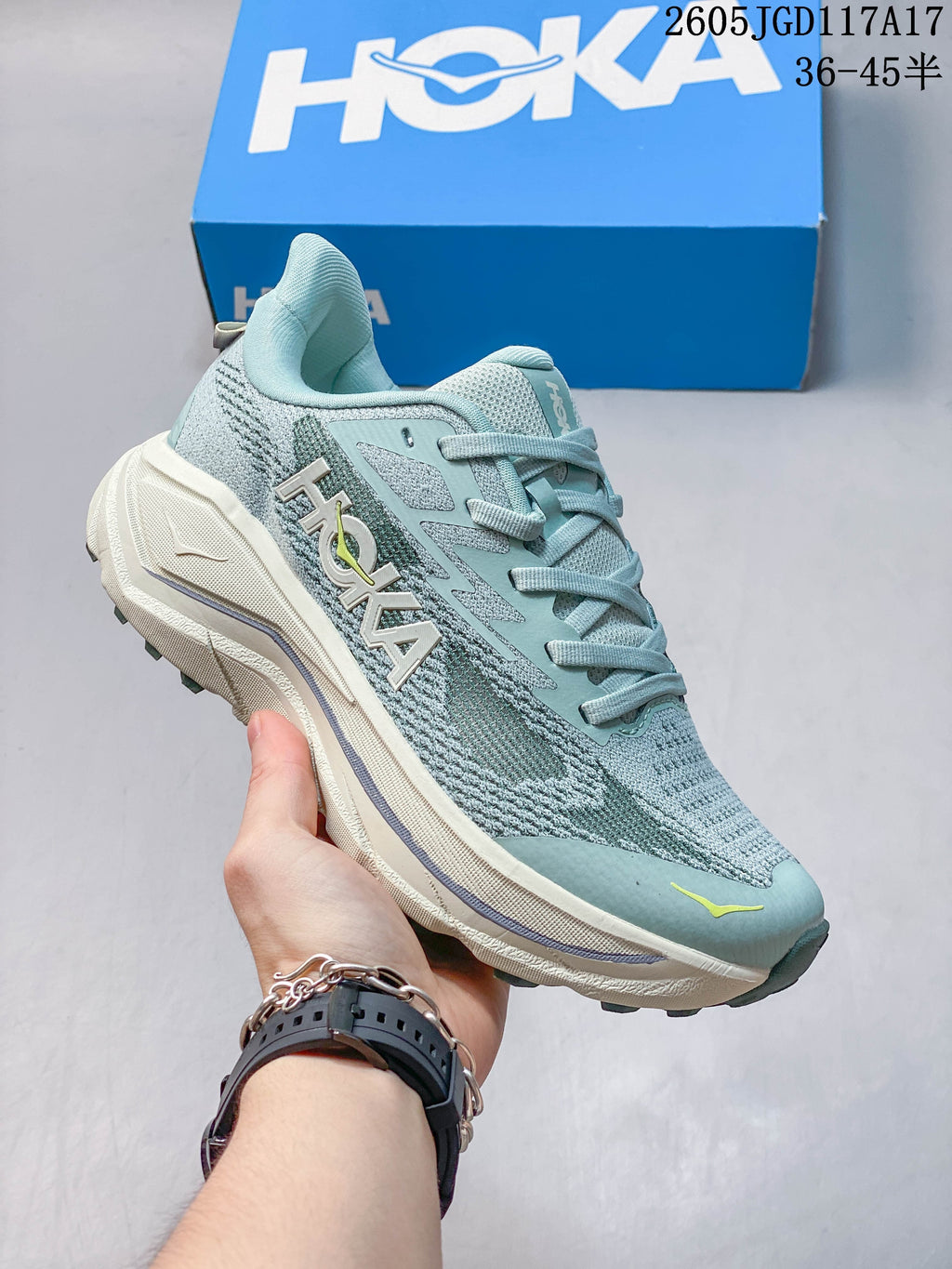 Light blue Hoka Mafate Speed 2 shoe with a cream-colored midsole.