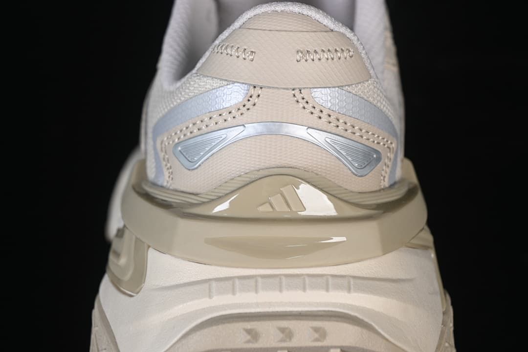 Rear view showing the sneaker heel panel and sculpted midsole