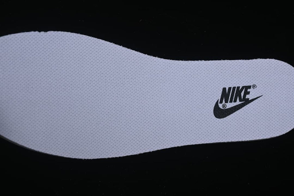 Close-up of a white insole with a Nike logo