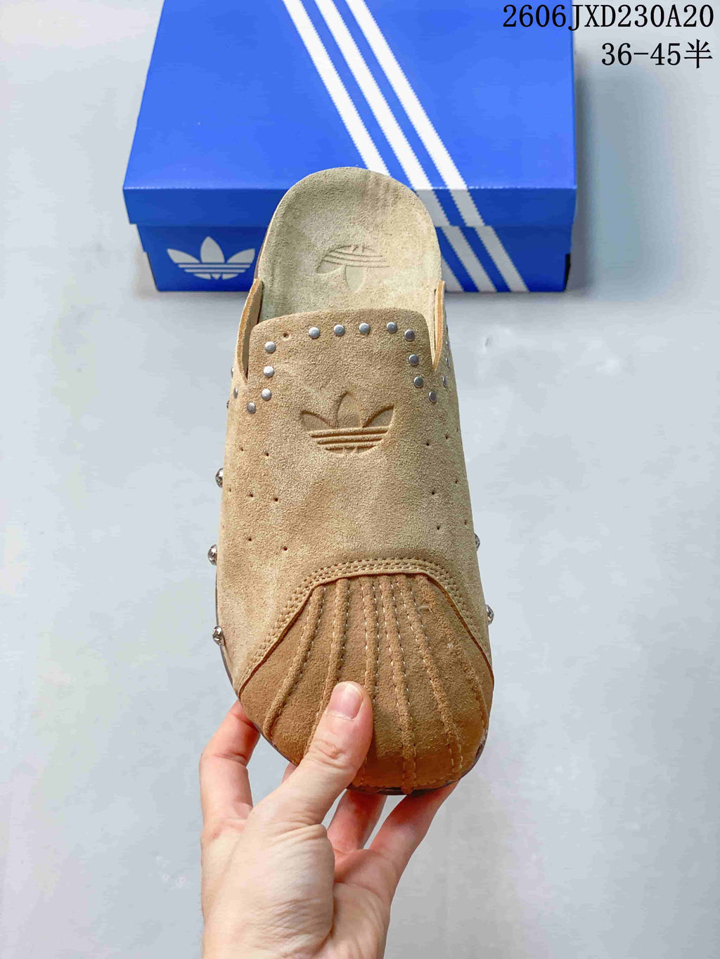 Top view of a tan adidas Adimule mule slide with trefoil detail