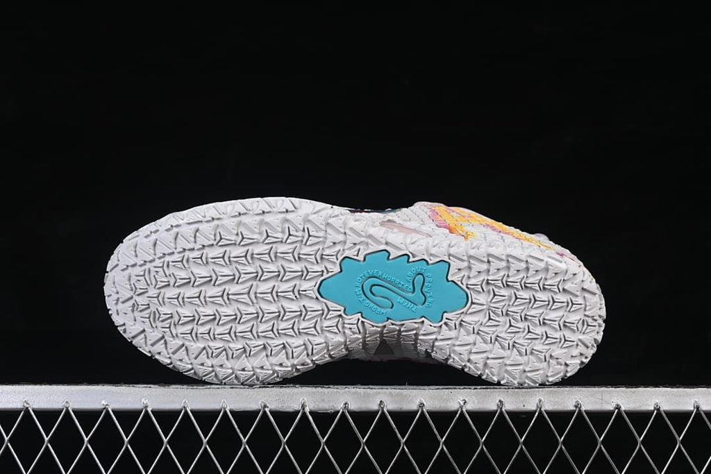 Outsole view showing patterned tread and a blue central detail