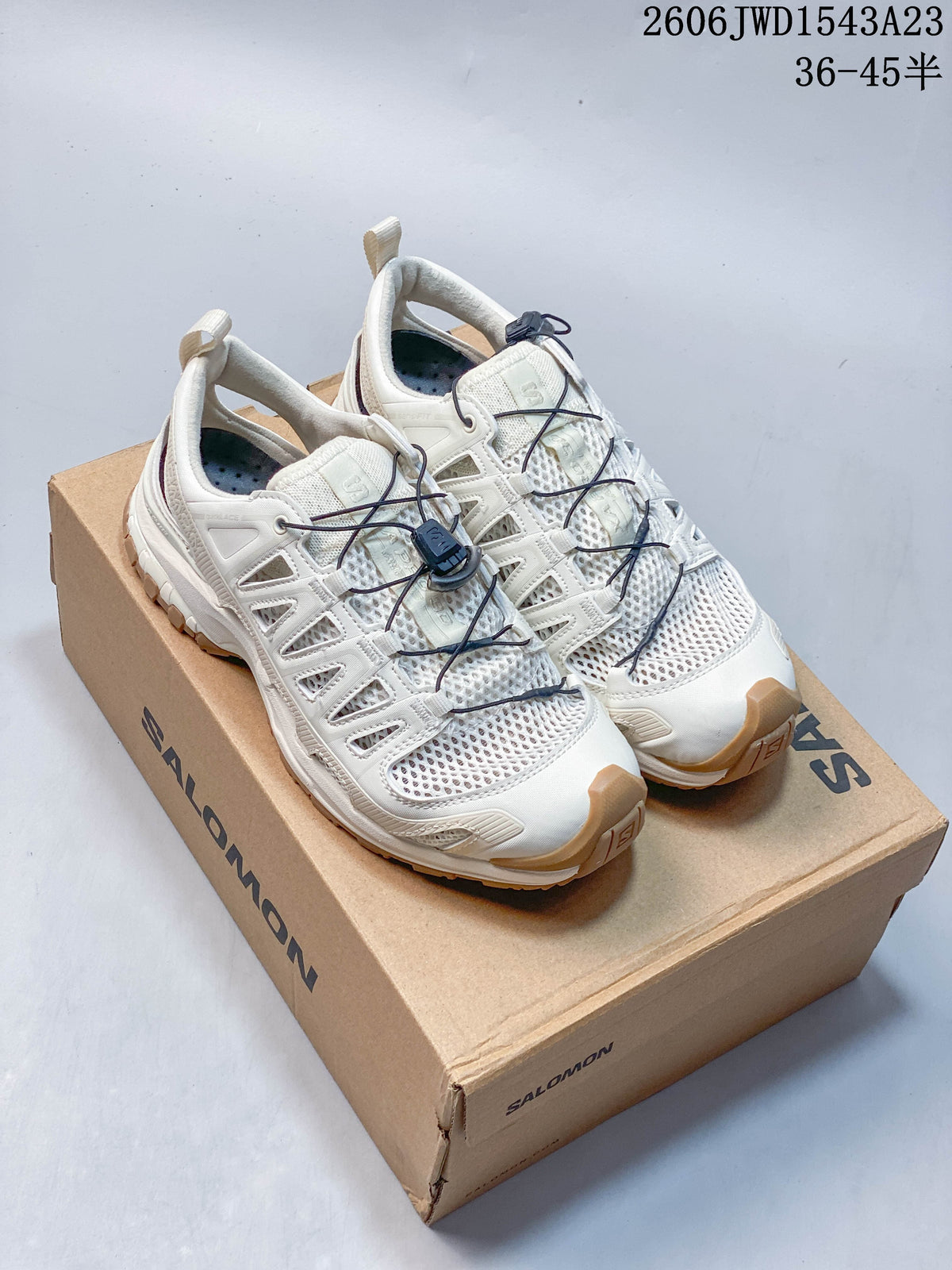 Off-white Salomon XA Pro 3D Amphib shoes displayed on a branded box