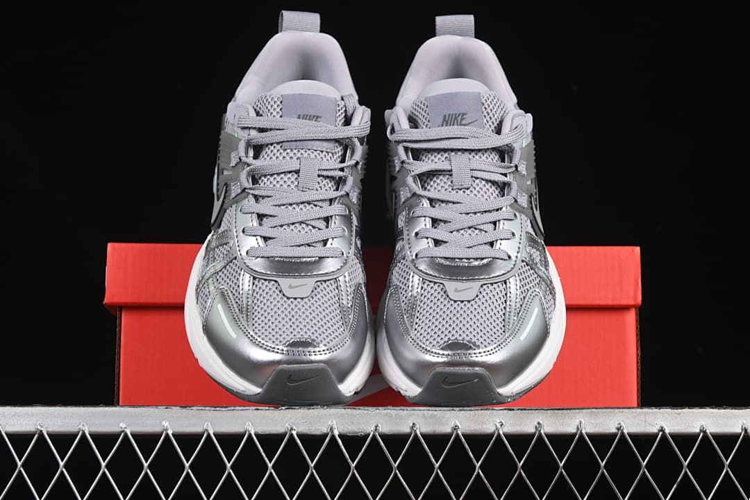 Front view of the pair showing the mesh toes and metallic-look overlays