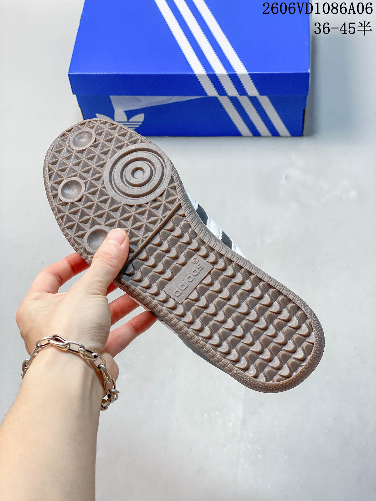 Close-up of the brown patterned outsole on the Adidas mule sneaker