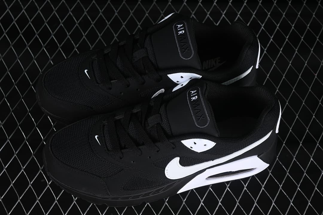 Pair of black and white Air Max Correlate sneakers viewed from above