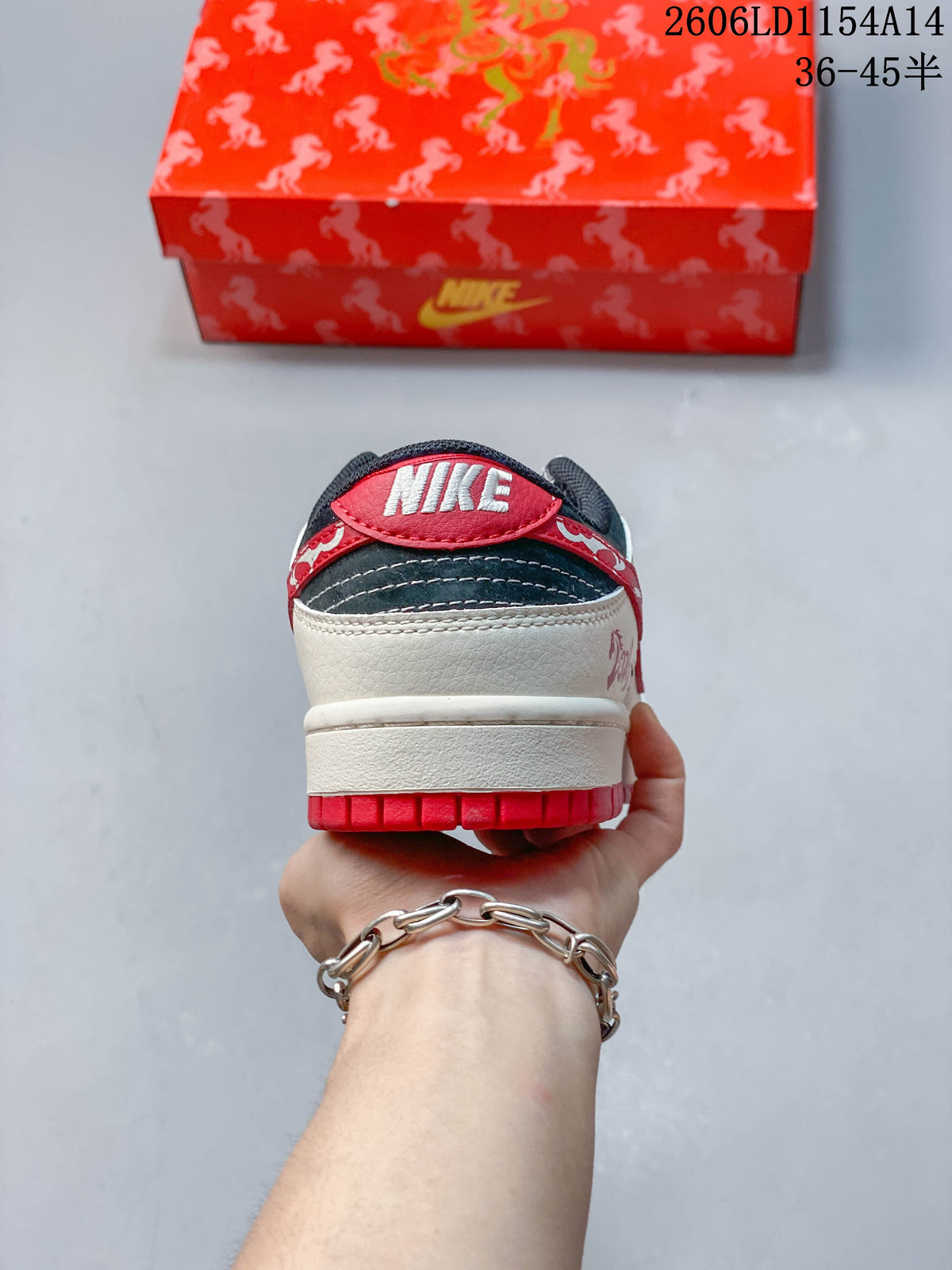 Rear view of the sneaker showing a dark collar, red heel tab, and cream heel panel