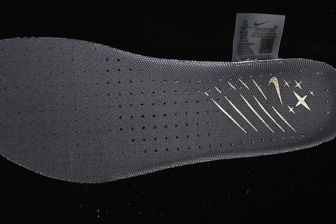 Close-up of the dark insole and shoe size label