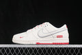 Side view of a white low-top sneaker with red accents, an outlined Swoosh, and a Supreme-branded heel detail.