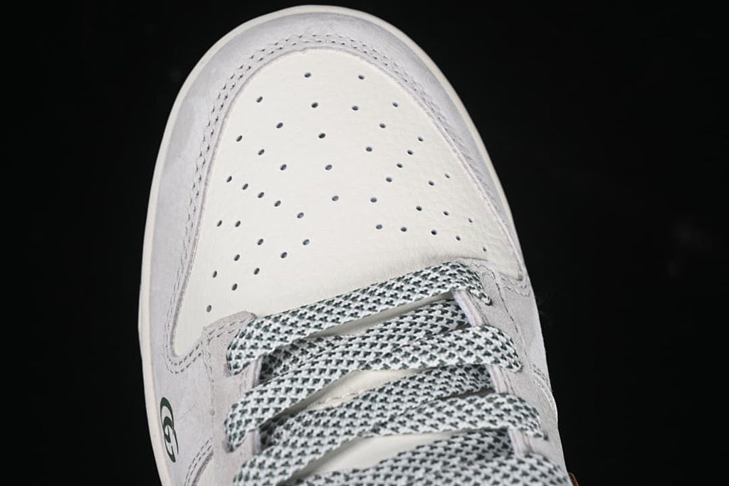 Top-down view of the perforated toe and patterned laces