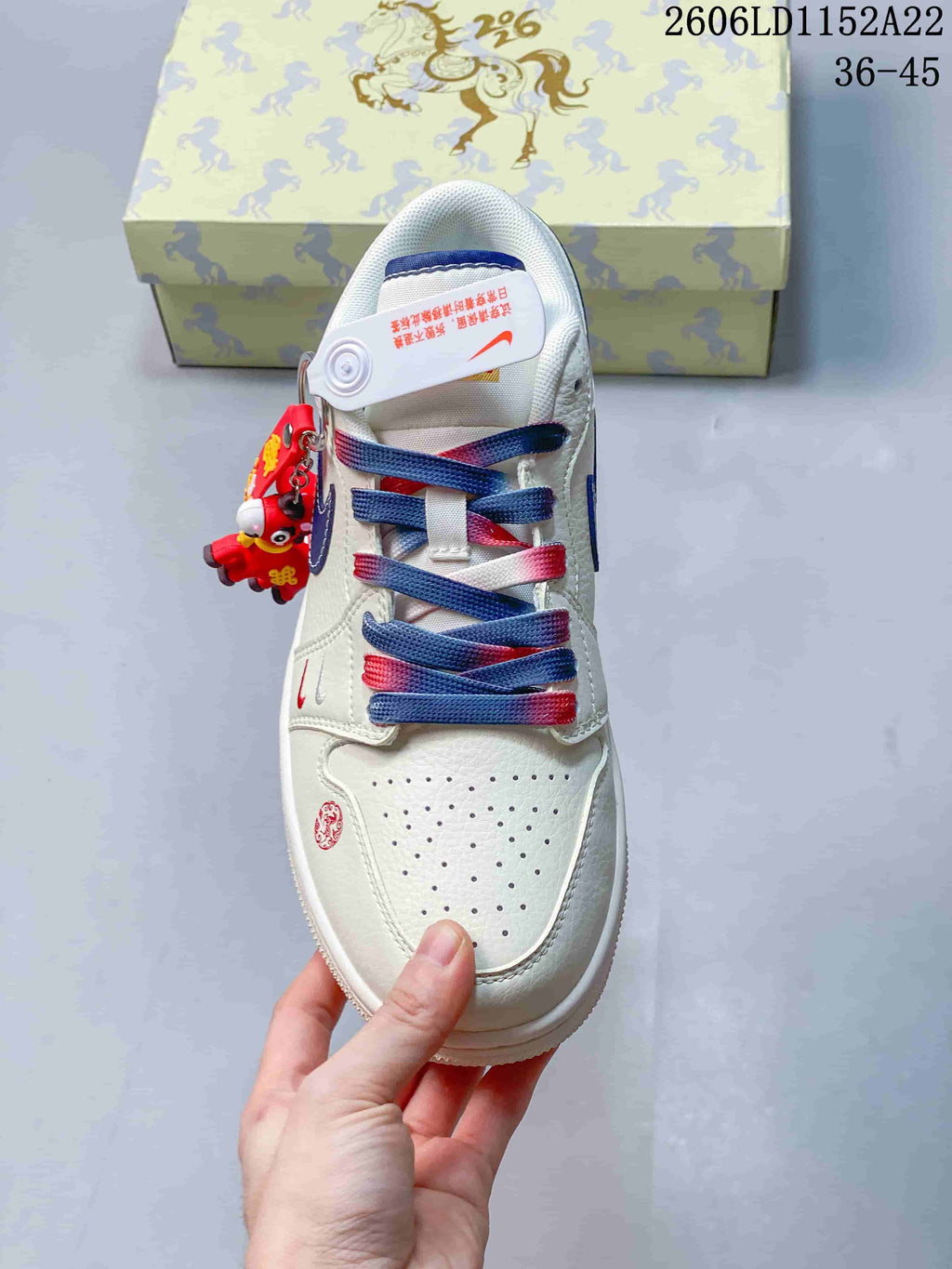 Top view showing perforated toe, multicolor laces, and decorative details