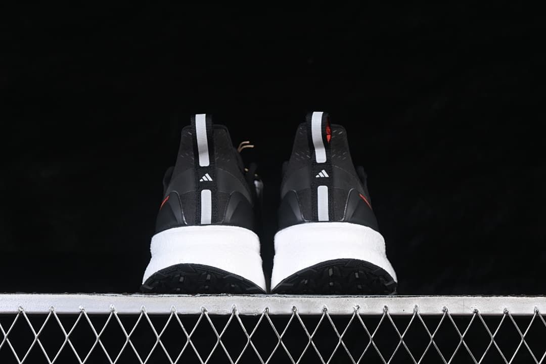 Rear view of the pair showing heel tabs and white midsoles.