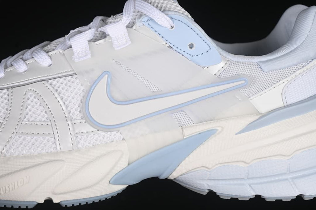 Close-up of the side Swoosh, mesh panels, and sculpted midsole
