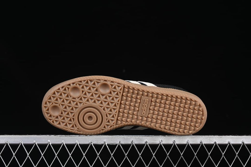 Underside view showing the patterned gum-colored outsole
